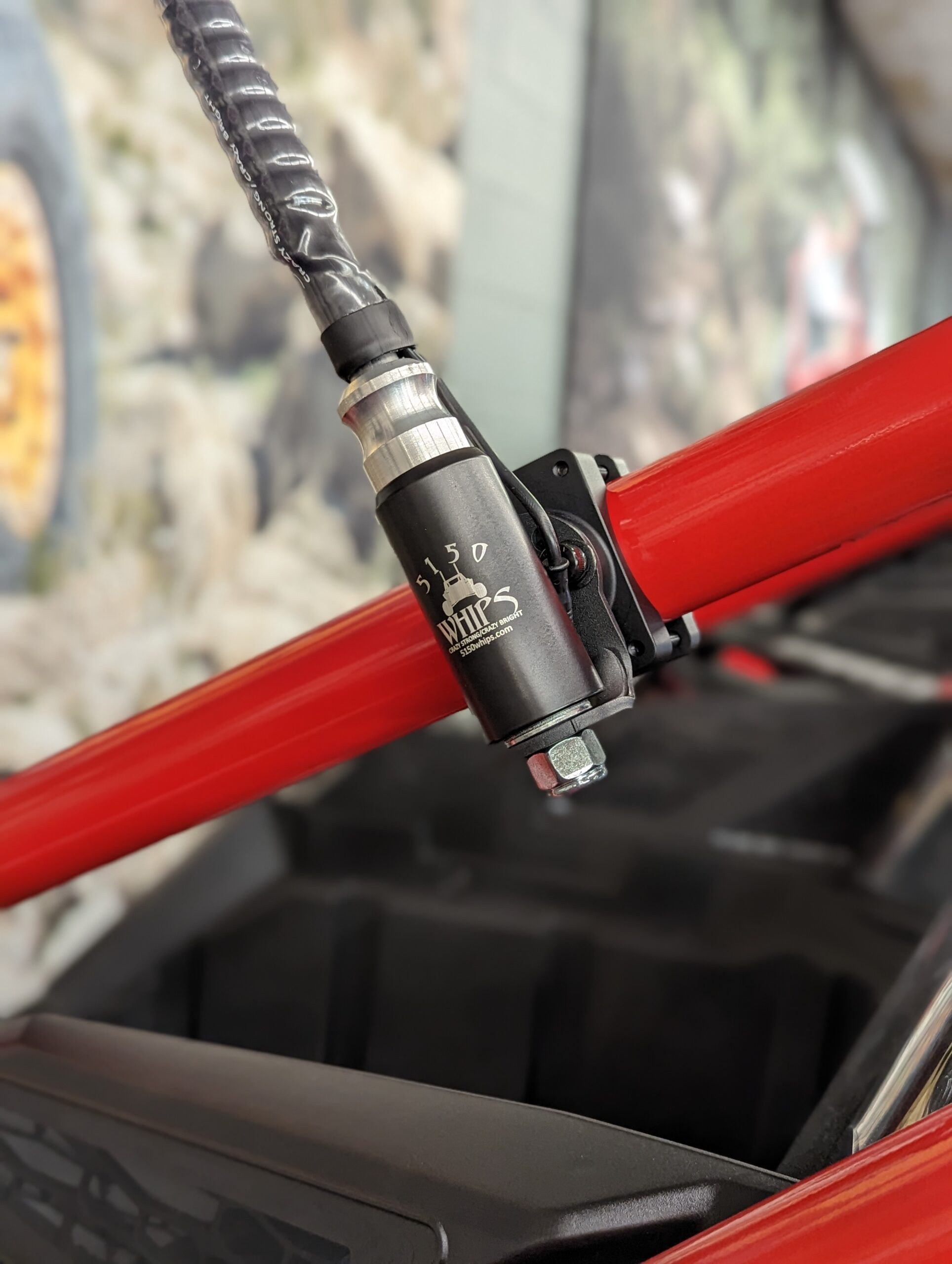 utv whip mount roll bar