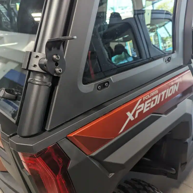 Pro Fit Whip Mount installed on a Polaris Xpedition UTV, demonstrating full 360° rotation