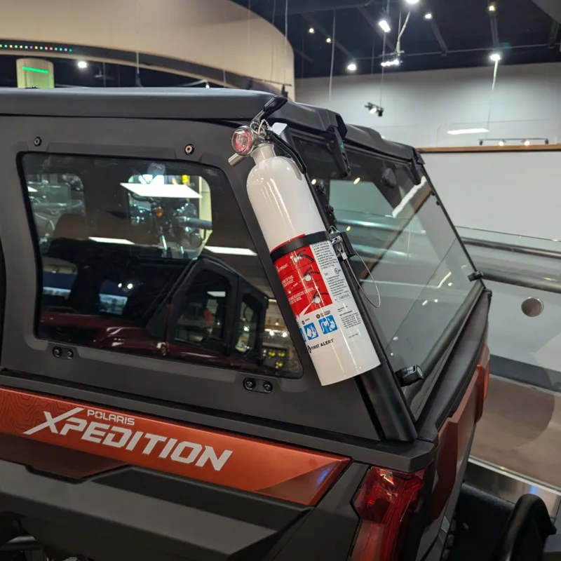 A-B-C rated fire extinguisher mounted on Polaris Xpedition exterior