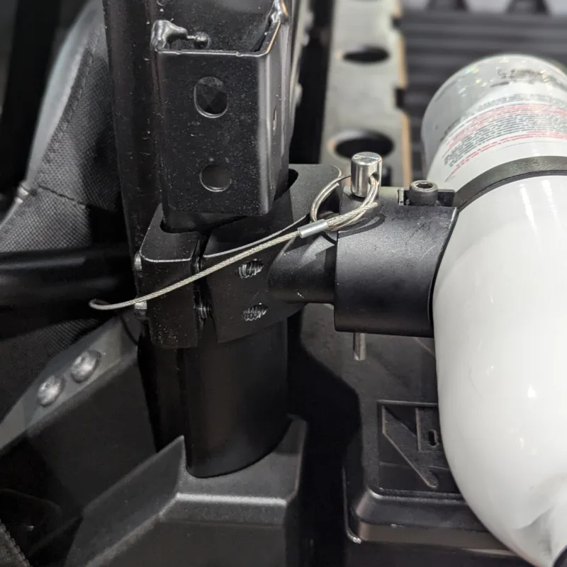 Adjustable fire extinguisher mounted on exterior of Polaris Ranger