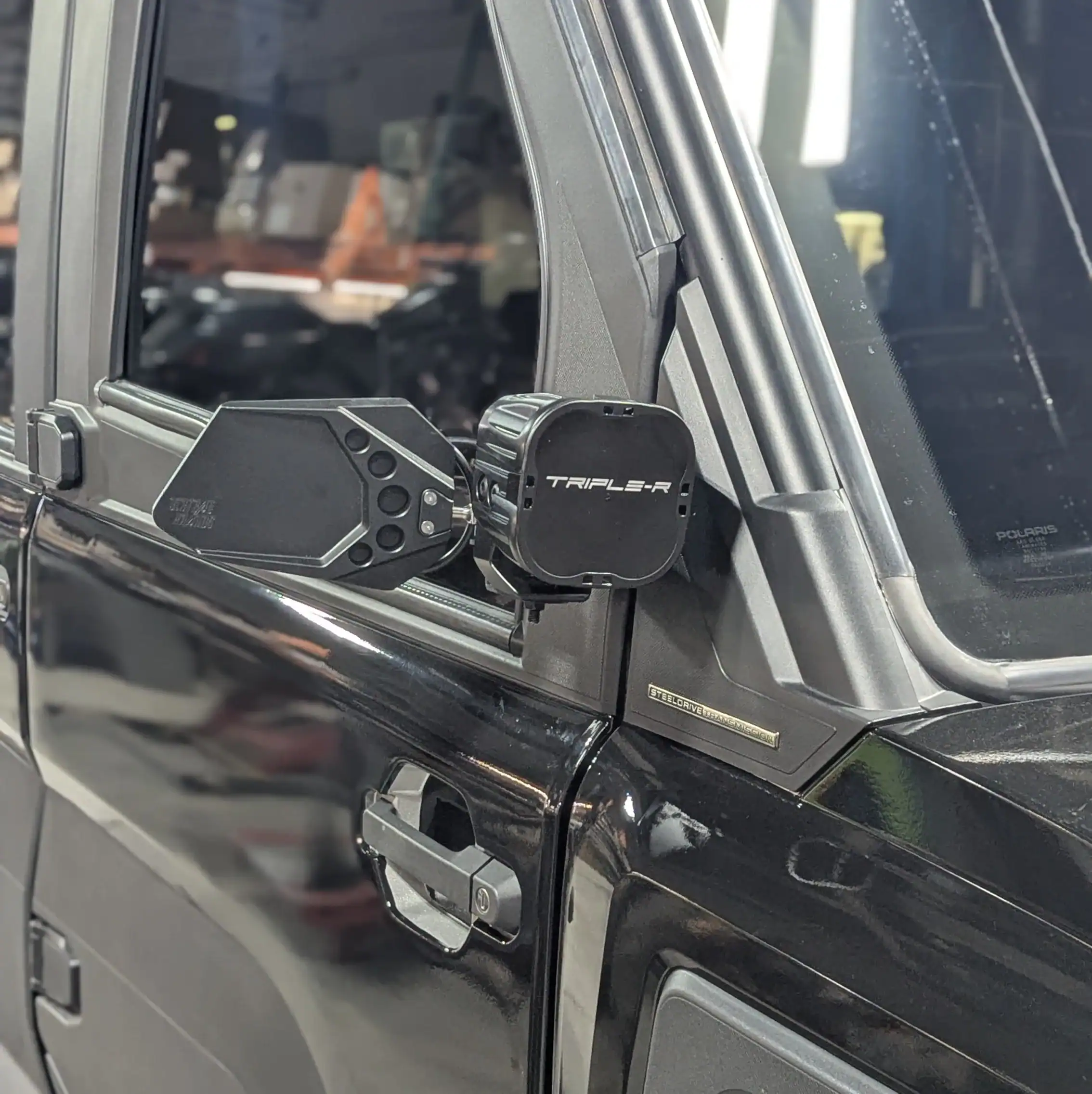 Polaris Ranger XD 1500 with door mounted billet mirror and pod light