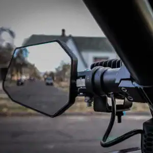 driver side view from inside a polaris rzr pro r with dirtbag brands mirror