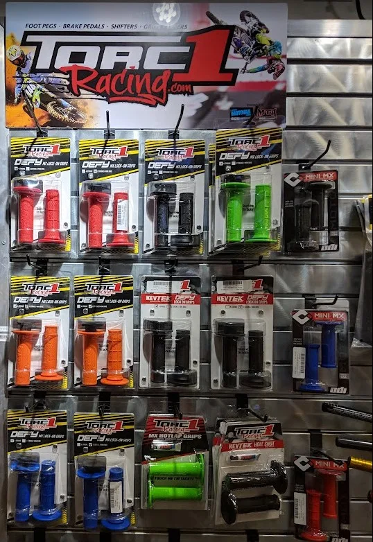 Torc1 Racing grips and rider controls displayed following the acquisition of Torc1 Racing by Dirtbag Brands