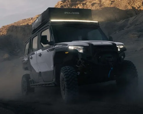 2027 Polaris XPEDITION overland build with rooftop tent exploring rugged desert terrain